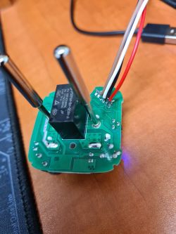 Image of a circuit board with attached wires.