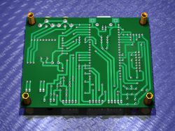 Visualization of a single-sided PCB with green laminate and copper traces.