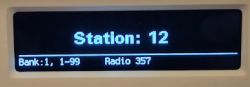 Radio screen displaying station number 12 with bank 1 and label Radio 357.