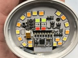 Inside View of the eWeLink Zigbee LED Bulb – BL702 Module Disassembled eWeLink Zigbee LED bulb with exposed BL702 module on a circuit board.