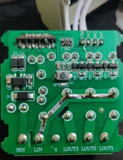 Close-up of a PCB with various electronic components and connectors.