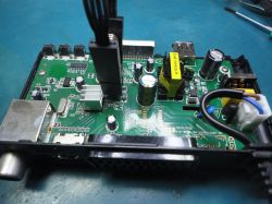 Image of the mainboard of a WIWA H.265 decoder with visible electronic components.
