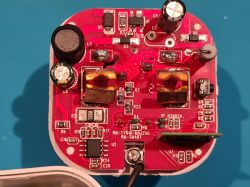 Interior of Wi-Fi Smart Plug RMC021 Interior of a red PCB of the Wi-Fi smart plug model RMC021.