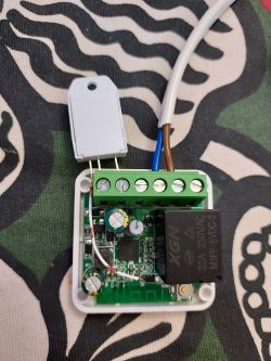 Modified Tuya relay controller with attached DHT22 sensor.