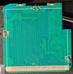 Backside of the Tuya Wi-Fi Thermometer PCB Rear view of the PCB from a Tuya Wi-Fi smart thermometer.