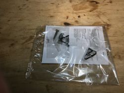 Ceiling lamp Woox mounting kit in transparent packaging.