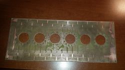 Printed Circuit Board for Nixie Tubes Printed circuit board with cutouts for tubes.