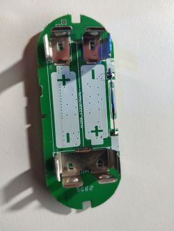 Door/Window Sensor PCB with Battery Holders PCB of a door/window sensor with battery holders.