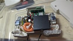 EARU RDCBC2-WiFi device with open casing showing internal components, including a WiFi module on a daughter board.