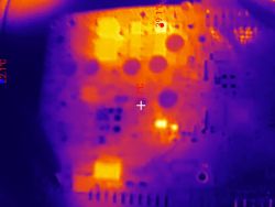 Thermal image of a PCB with measurement markers showing temperatures up to about 39.1°C