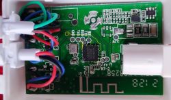 Close-up of a PCB with an LN8825B chip and wires.