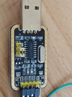 USB TTL Converter on PCB Photo of a USB TTL converter on a PCB with electronic components.