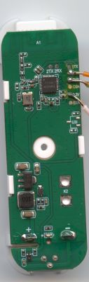 Green PCB with an IC and three wires soldered on the right side, shown in close-up