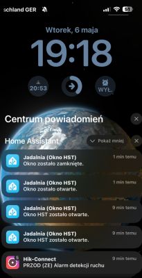Home Assistant notifications on a smartphone lock screen about opening and closing a dining room window.