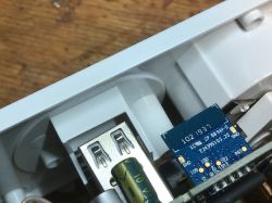Inside View of Overmax Flow Multi Control Power Strip Interior of a power strip showing a WiFi module and USB ports.
