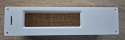 Prototype electronic device casing with a cutout for a display.
