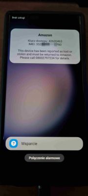 Ekran telefonu z komunikatem o zgubionym lub skradzionym urządzeniu.