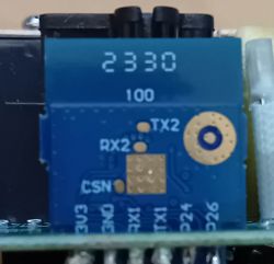 Close-up of CB2S PCB with Beken Chip Close-up view of a CB2S PCB with pin type labels on the Beken chip.