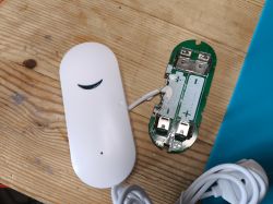 Dismantled water leak sensor Electronic circuit of a water sensor with an open casing.