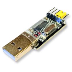 USB to UART converter with visible electronic components on the circuit board