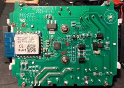 Close-up of a circuit board with various electronic components and a chip labeled CB04-SBL-B.