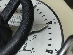 Close-up of an autotransformer meter gauge showing a reading of 175V.