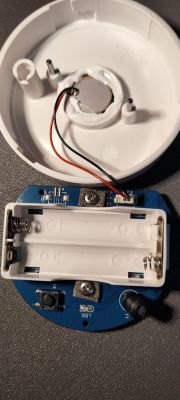 Inside of Tuya Water Leak Sensor Image of the interior of a Tuya water leak sensor showing the circuit board and battery compartment.