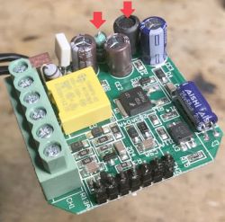 The image shows an electronic circuit board with closely placed coils indicated by arrows.