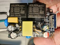 Close-up of a circuit board with connectors and electronic components, including AMS1117.