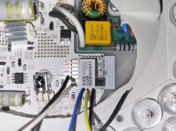 ESP module on a circuit board with electronic components and wires