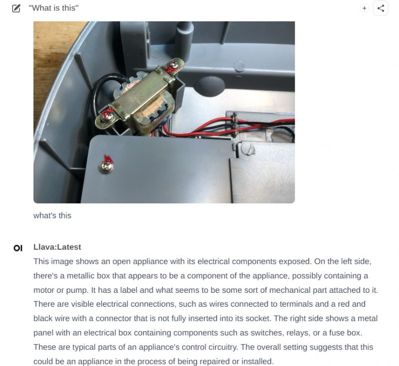 Interior of an Electrical Appliance with Connected Wires Open electrical appliance with a metallic box and wires connected.