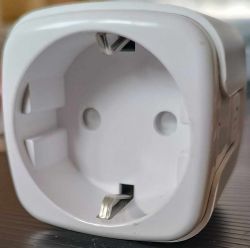 Electrical Socket with Casing Close-up of an electrical socket with a plastic casing.