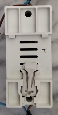 Back of Device from Aliexpress View of a device from Aliexpress with visible holes and a latch.
