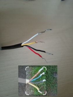 Close-up of wires with different color insulation and exposed tips; a comparison photo of other colored wires in the corner.