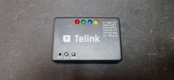 Black Telink programmer with LED indicators and labeled pinouts