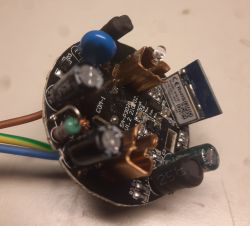 Disassembled PCB with WB2S Wi-Fi module and various electronic components