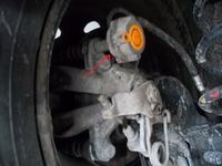 Peugeot 207 2007 - Co to za element na prowadnicy hamulca tylnego?