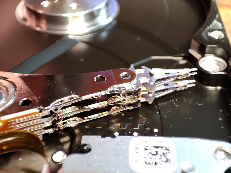 Interior of a Damaged Hard Drive Hard drive heads inside a damaged HDD