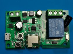 WiFi Relay Circuit Board DC7-32Pro Close-up of a WiFi relay circuit board with green connectors and a Songle relay.
