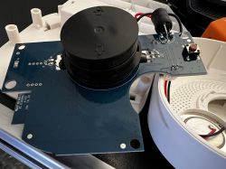Smoke Detector with Wi-Fi Module on PCB Printed circuit board with a smoke detector on a blue PCB.