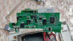PCB of Tuya device with visible electronic components and part markings.