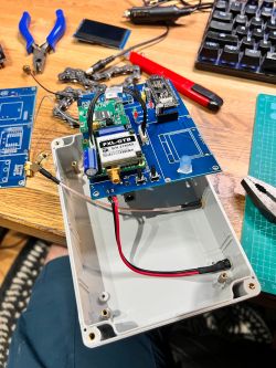 Interior of a GPS Tracker Project Interior of an electronic GPS tracker with visible components.