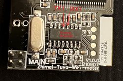 Close-up of a PCB with the RN8209C chip and marked TX1 and RX1 pins.
