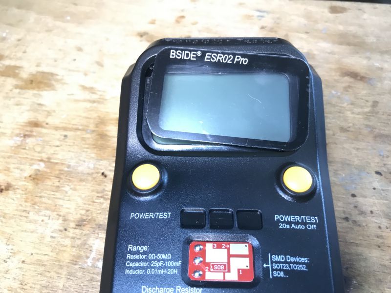 BSIDE ESR02 Pro Component Tester BSIDE ESR02 Pro component tester on a wooden table.