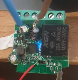 Electronic Module with Relay Close-up of an electronic module with soldered wires and a visible XGN relay.
