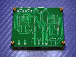 Single-sided PCB with green laminate and yellow mounts.