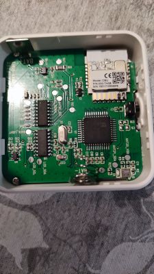 Internal view of an electronic device with a visible main board and CBU module.