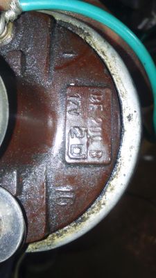 Zbliżenie na cewkę zapłonową z oznaczeniami: 1, 15 i BE 200 B 12V 2D.