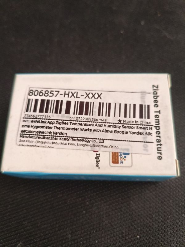 Close-up of Zigbee eWeLink temperature and humidity sensor packaging