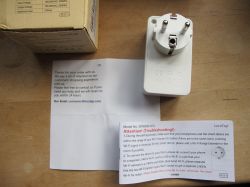 LoraTap SP800WJ-EU Smart Plug and Documents LoraTap SP800WJ-EU smart WiFi plug with leaflets.